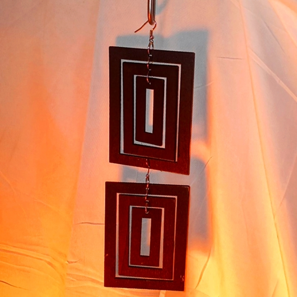 Optical illusion dangle earrings